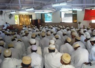 Mumineen at Zenith Hall during the Wa'az Mubaarak
